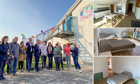 Struttura residenziale con persone che interagiscono in un ambiente accogliente