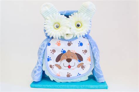 Schema di assemblaggio di una torta di pannolini a forma di gufo